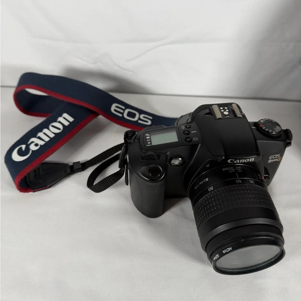 Canon Black Digital Camera with Lens and Strap